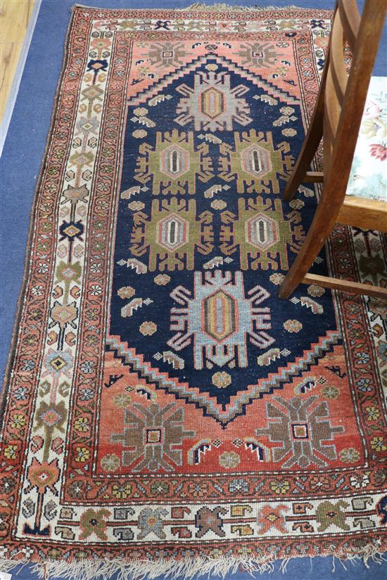 An Eastern rug, 200 x 115cm
